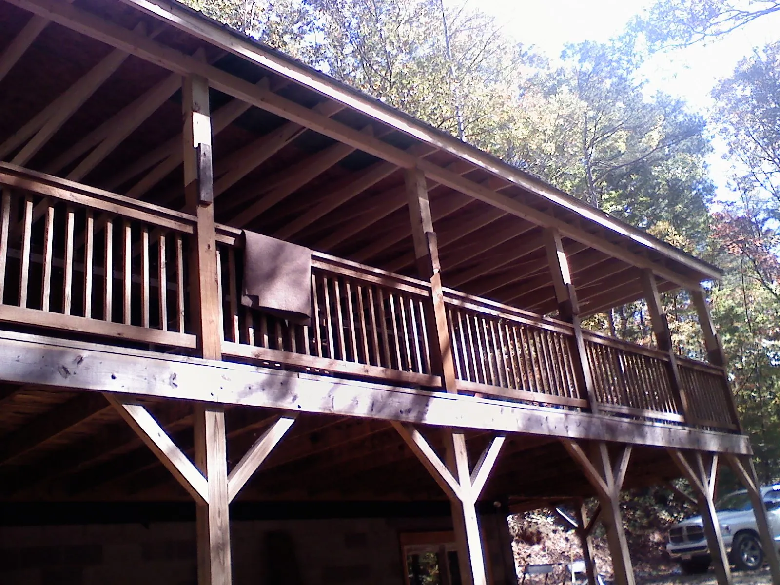Timber framing under a new elevated porch and deck — Roof Leak Repair in Clay by Roofing Brothers
